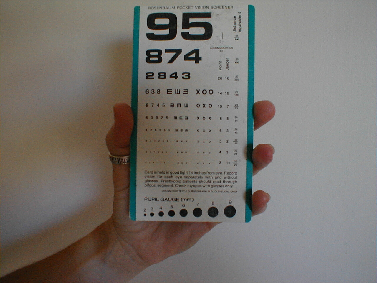 Hand held visual acuity card